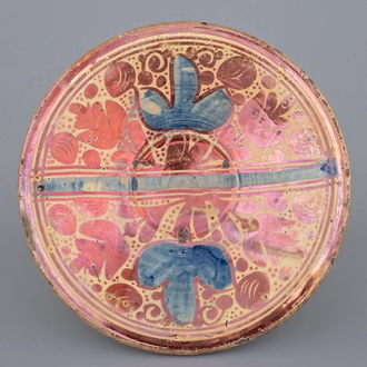 A Hispano Moresque plate with blue and luster glaze, 16th C.